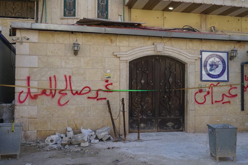 The main door of the maternity hospital of the Syrian American Medical Association in the town of Dana, which was closed due to severe damage