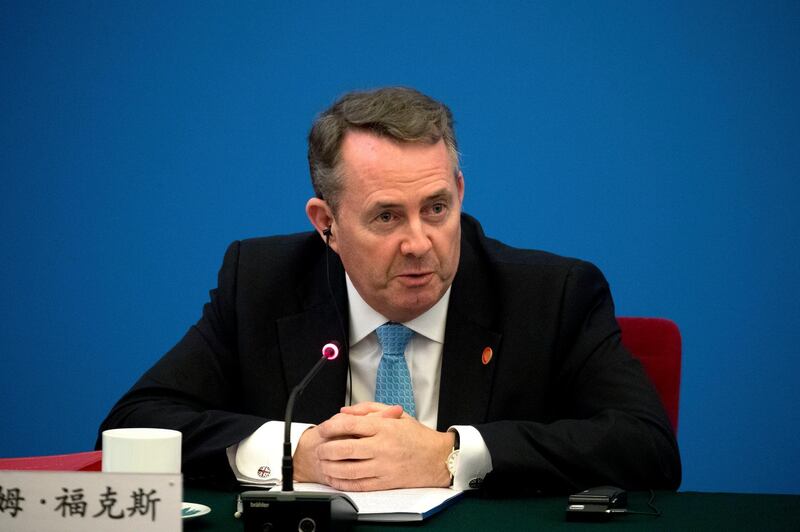 FILE - In this Wednesday, Jan. 31, 2018 file photo, British Secretary of State for International Trade Liam Fox speaks during the inaugural meeting of the UK-China CEO Council at the Great Hall of the People in Beijing. Britain's international trade minister says it's likely the U.K. will fail to agree a divorce deal with the European Union before it leaves the bloc next year. Trade Secretary Liam Fox told the Sunday Times newspaper on Sunday, Aug. 5 that "intransigence" by EU officials "is pushing us towards no deal." (AP Photo/Mark Schiefelbein, file)