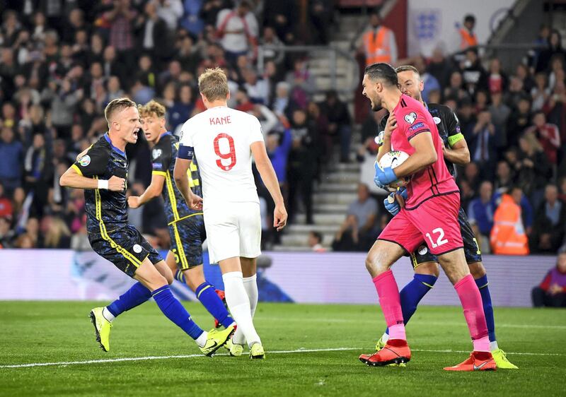 SOUTHAMPTON, ENGLAND - SEPTEMBER 10: Arijanet Muric of Kosovo is congratulated by team mates after saving a penalty during the UEFA Euro 2020 qualifier match between England and Kosovo at St. Mary's Stadium on September 10, 2019 in Southampton, England. (Photo by Clive Mason/Getty Images)