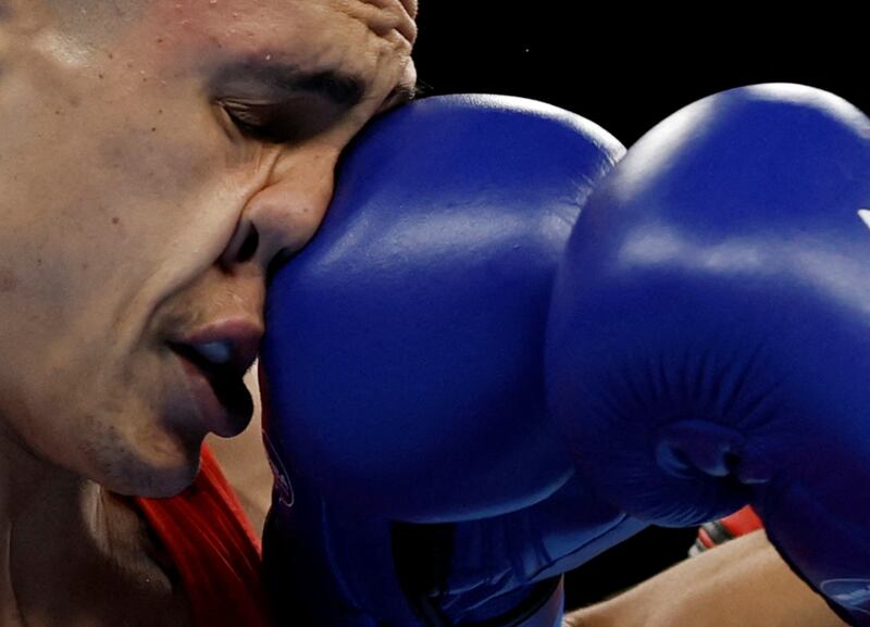 Australia's Charlie Senior in action against Nauru's Christon Amram at the Commonwealth Games in Birmingham, Britain. Reuters