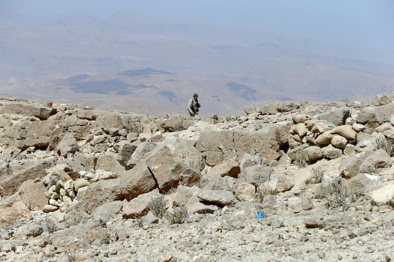 A Yemeni soldier walks on a mountain on the frontline of fighting with Houthis in Nihem area near Sanaa, Yemen January 27, 2018. Picture taken January 27, 2018. REUTERS/Faisal Al Nasser