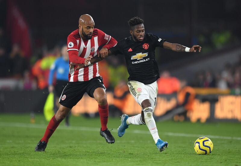 David McGoldrick, left, of Sheffield United and Manchester United's Fred. Getty