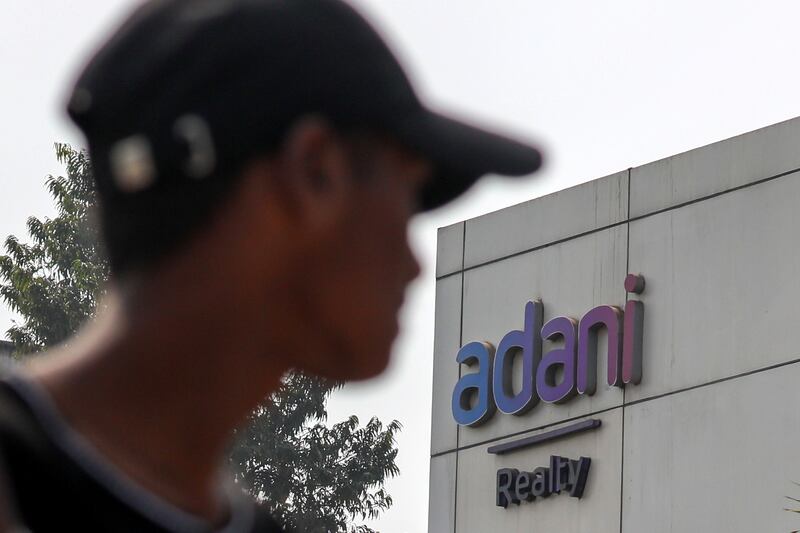 The market rout that hit Adani Group will likely reduce the company's ability to raise money for capital expenditure projects or to refinance debt over the next year or two, according to Moody’s Investors Service. EPA
