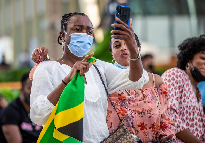 Getting a selfie at Jamaica national day celebrations at Al Wasl Dome. Victor Besa / The National