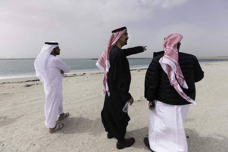 Deira Islands will add a further 40km of coastline, 21km of which will be beaches, to Dubai’s waterfront. Above, Nakheel chairman Ali Rashid Lootah, centre, tours the Deira Islands project. Christopher Pike / The National