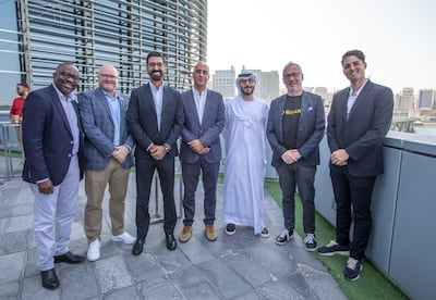 From left, Dapo Ako, managing director of J. Awan & Partners; Stuart Isted, general manager of Crypto.com; Jehanzeb Awan, founder of J. Awan & Partners; Samir Satchu, senior vice president at BitOasis; Basil Askari, co-founder and chief executive of MidChains; Dominic Longman, senior executive officer at Binance; and Joseph Dallago, co-founder and chief executive of Rain Financial at the launch of the Middle East, Africa and Asia Crypto Blockchain Association in Abu Dhabi on Tuesday. Ruel Pableo / The National