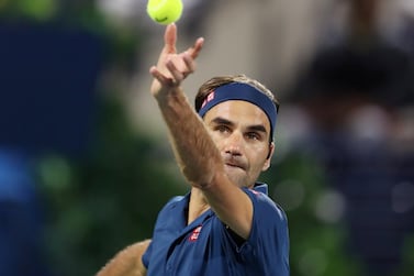 Roger Federer serves on his way to victory over Philipp Kohlschreiber at the Dubai Duty Free Tennis Championships. Reuters