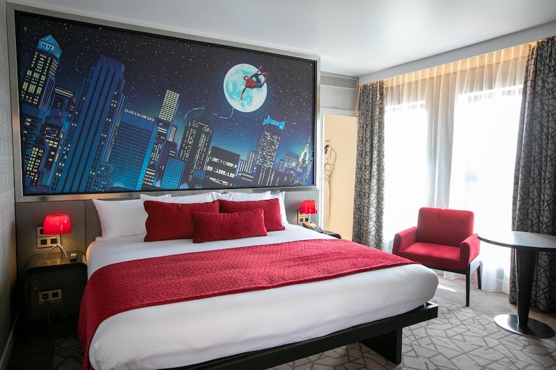 The Spider-Man Suite features a large drawing of Spider-Man swinging through New York City. Getty Images