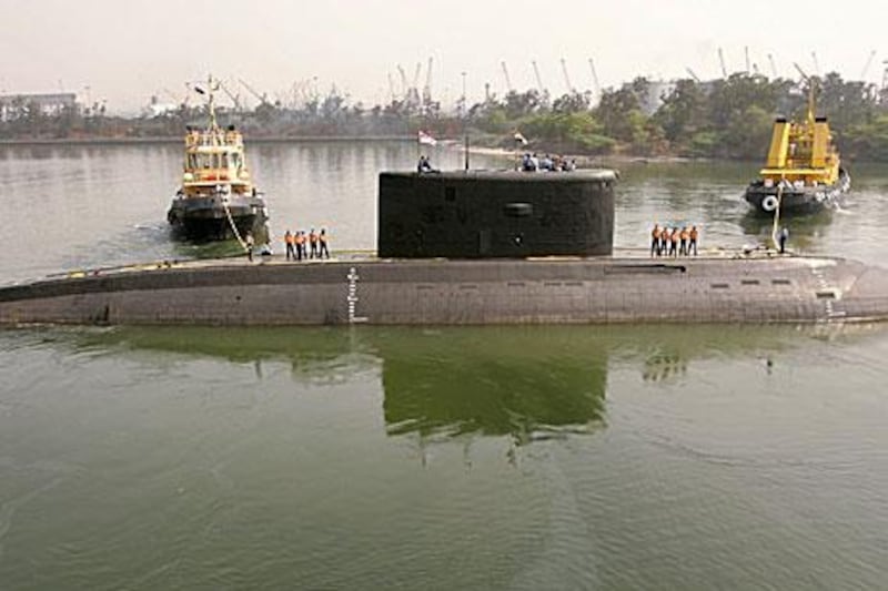 INS Sindhurakshak, pictured in 2006,  caught fire after an explosion and sank early Wednesday at its home port in Mumbai.