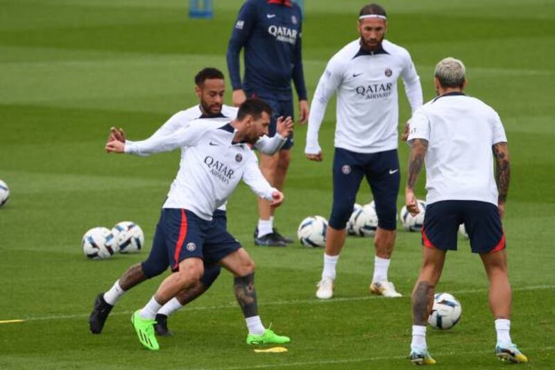 Neymar, Lionel Messi and Sergio Ramos train on Friday. AFP