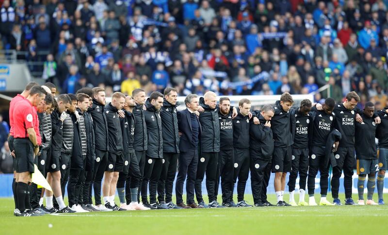 Cardiff City v Leicester City - Cardiff City Stadium, Cardiff, Britain -  Leicester City players and staff during a minutes silence as part of remembrance commemorations and for Vichai Srivaddhanaprabha, late chairman of Leicester City Football Club, before the match. Reuters