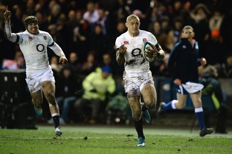 Mike Brown of England scores a try during the RBS Six Nations match against Scotland on Saturday in Edinburgh,Scotland. Jeff J Mitchell/Getty Images