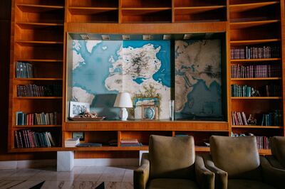 Bourguiba's private office features nested hand-painted maps — the inner, a detailed map of Tunisia, and the outer a map of the world with Tunisia at its centre. Erin Clare Brown / The National