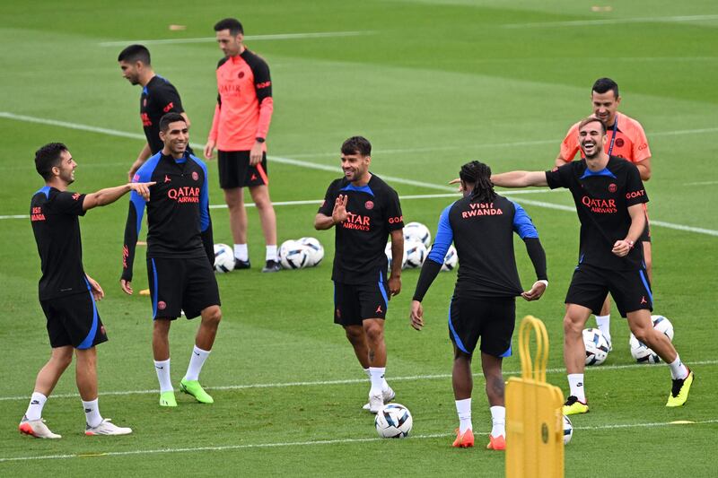 Defender Achraf Hakimi, Juan Bernat and Fabian Ruiz take part in a training session. AFP