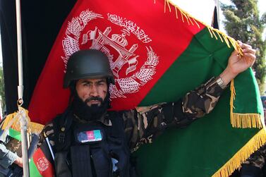 An Afghan soldier marks the Independence Day in Helmand, Afghanistan, 19 August 2019. EPA