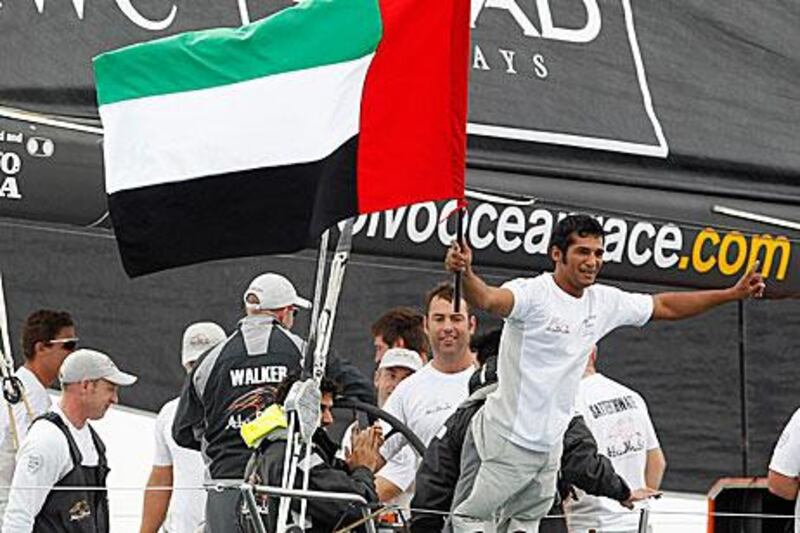 Abu Dhabi Ocean Racing team members celebrate their victory in the first in-port race in Alicante yesterday.