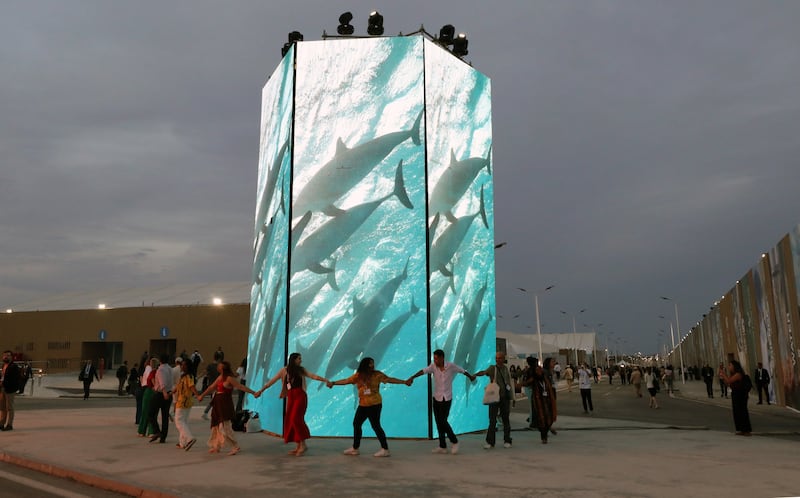 People attend the COP27 UN Climate Summit in Sharm El-Sheikh. EPA