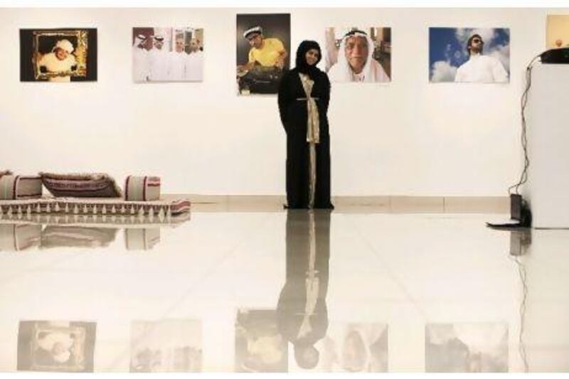 Amna Raisi's exhibition of portraits of men from the UAE opened yesterday in Dubai. Lee Hoagland / The National