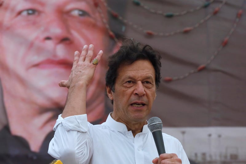 Imran Khan, chairman of the Pakistan Tehreek-e-Insaf (PTI), gestures while addressing his supporters during a campaign meeting ahead of general elections in Karachi, Pakistan, July 4, 2018. REUTERS/Akhtar Soomro