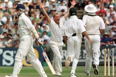 File photo dated 06-07-1997 Australian bowler Shane Warne celebrates bowling Alec Stewart (departing left) for one at Old Trafford. Former Australia cricketer Shane Warne has died at the age of 52, his management company MPC Entertainment has announced in a statement. Issue date: Friday March 4, 2022.