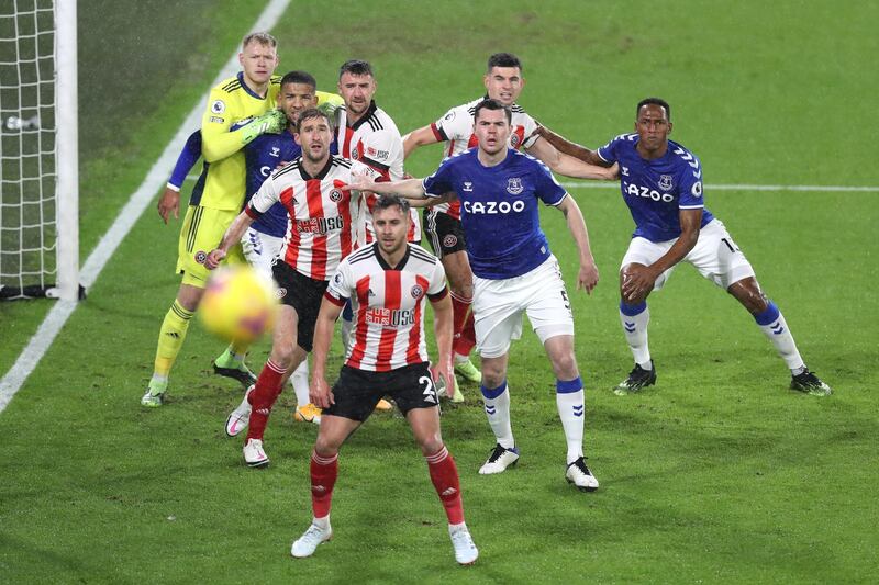 SHEFFIELD, ENGLAND - DECEMBER 26: Players from both sides battle for the ball from a corner during the Premier League match between Sheffield United and Everton at Bramall Lane on December 26, 2020 in Sheffield, England. The match will be played without fans, behind closed doors as a Covid-19 precaution.  (Photo by George Wood/Getty Images)
