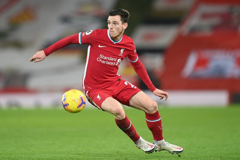 LIVERPOOL, ENGLAND - JANUARY 17: Andrew Robertson of Liverpool controls the ball during the Premier League match between Liverpool and Manchester United at Anfield on January 17, 2021 in Liverpool, England. Sporting stadiums around England remain under strict restrictions due to the Coronavirus Pandemic as Government social distancing laws prohibit fans inside venues resulting in games being played behind closed doors. (Photo by Michael Regan/Getty Images)