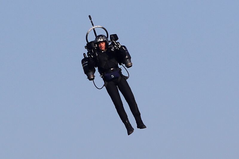 (FILES) In this file photo taken on April 21, 2018 "Jetpack Man" flies during the 2018 Red Bull Air Race World Championships in Cannes.  The Federal Bureau of Investigation said September 1, 2020 it had launched a probe after pilots landing at Los Angeles airport over the weekend reported seeing a person in a jet pack flying right next to them. / AFP / VALERY HACHE
