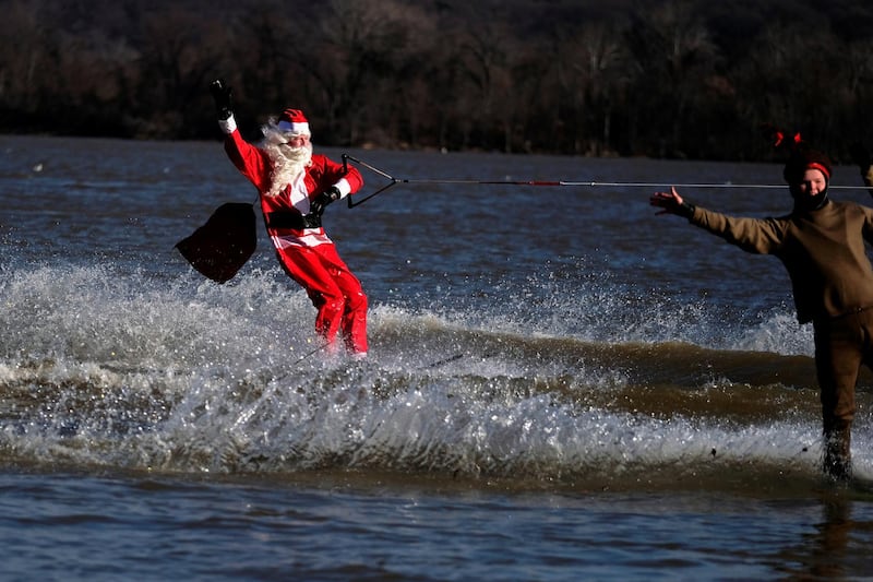 The Waterskiing Santa makes his annual Christmas Eve appearance along the waterfront in Alexandria, Virginia, U.S. Reuters