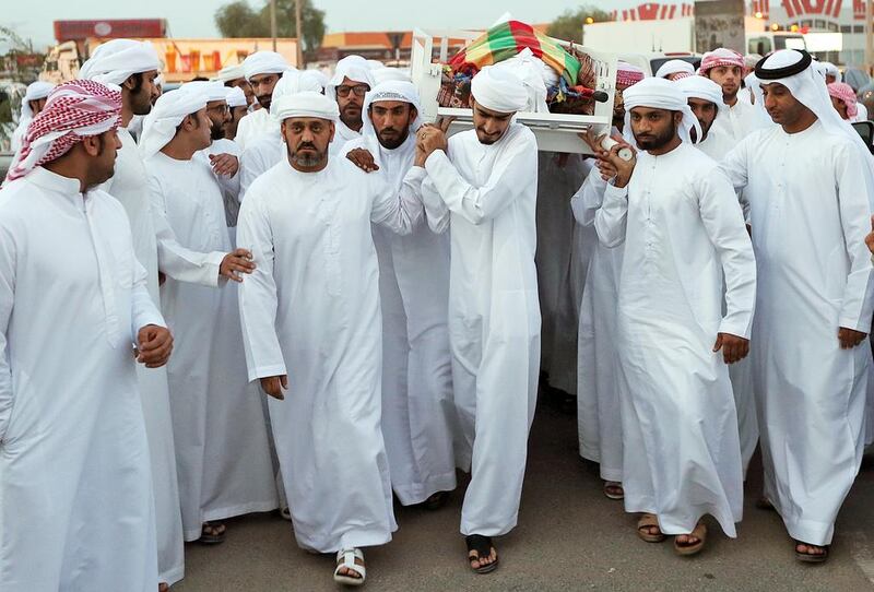 Emirati firefighter Jassim Al Baloushi died while trying to rescue the passengers of an Emirates airliner that crash-landed at Dubai International Airport on August 3. Satish Kumar / The National