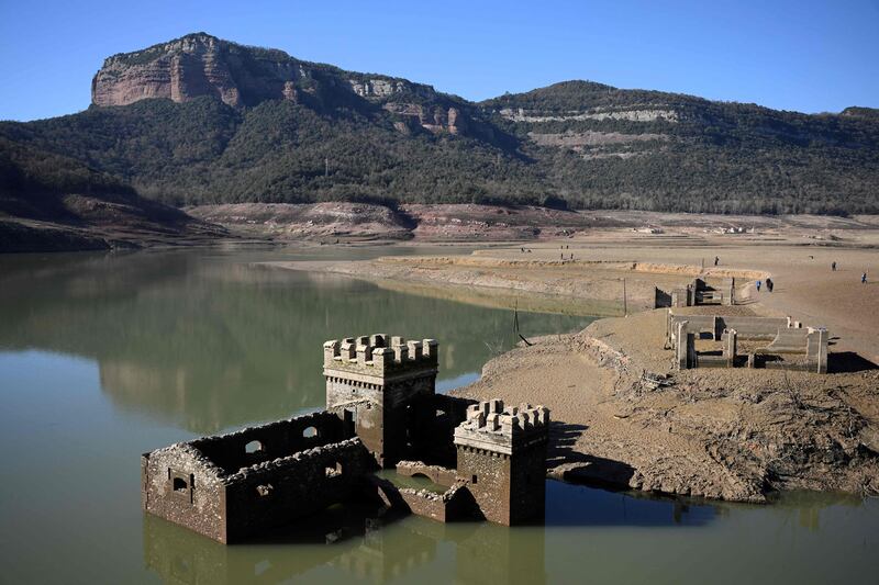 A partially submerged at the low water-level reservoir of Sau in Vilanova de Sau in Catalonia. AFP