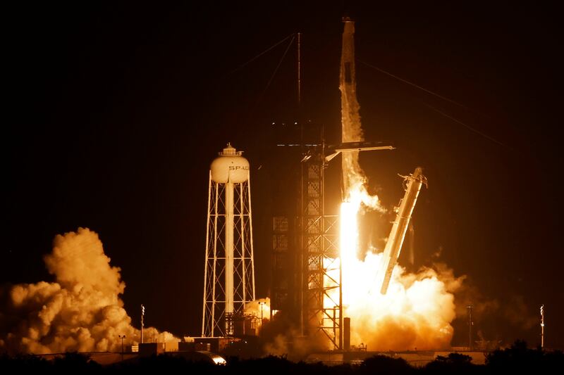 The Falcon 9 rocket carrying the astronauts lifts off. Reuters