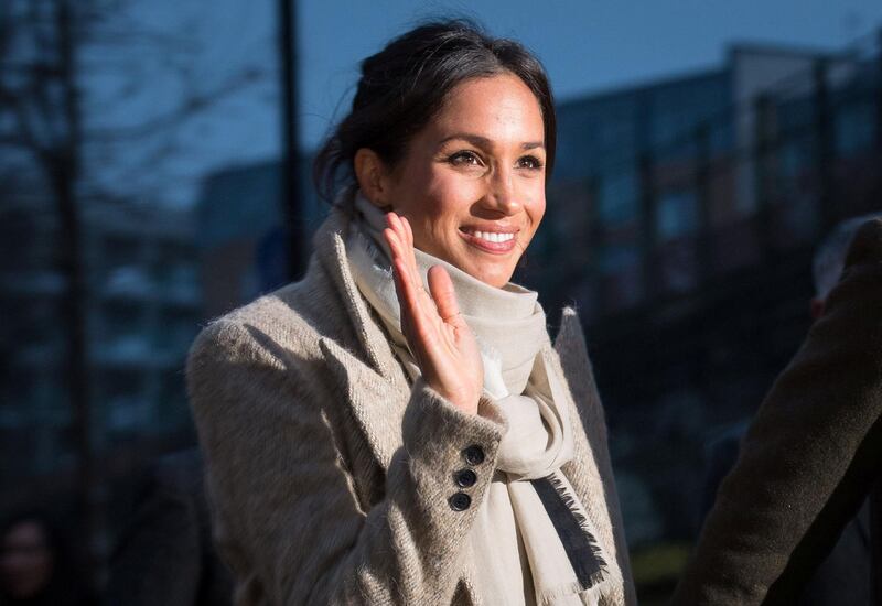 Meghan Markle waves to well wishers after visiting radio station Reprezent FM, with her fiancee Britain's Prince Harry, in Brixton, London  January 9, 2018. REUTERS/Dominic Lipinski/Pool