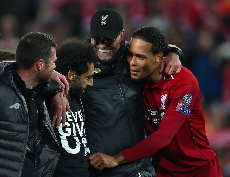 LIVERPOOL, ENGLAND - MAY 07: Jurgen Klopp, Manager of Liverpool, Mohamed Salah of Liverpool and Virgil van Dijk celebrate after the UEFA Champions League Semi Final second leg match between Liverpool and Barcelona at Anfield on May 07, 2019 in Liverpool, England. (Photo by Clive Brunskill/Getty Images)