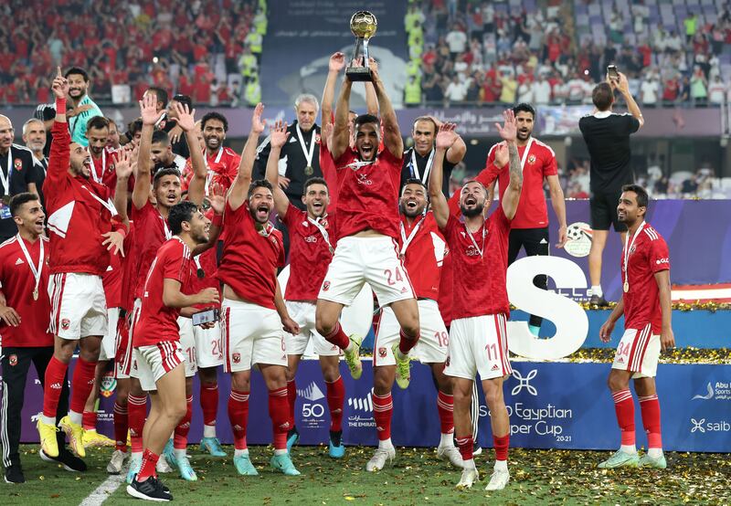Al Ahly celebrate winning the Egyptian Super Cup after victory over Zamalek at the Hazza bin Zayed Stadium in Al Ain on Friday, October 28, 2022. Chris Whiteoak / The National