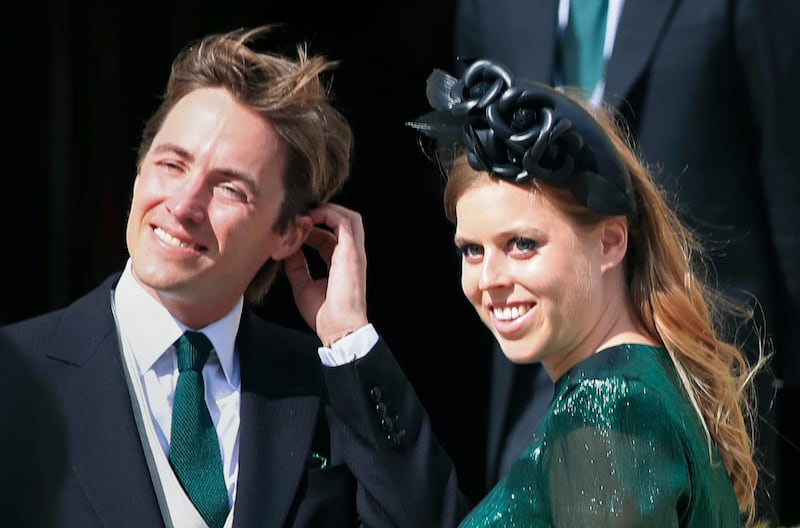 FILE - In this Aug. 31, 2019 file photo, Princess Beatrice and her then fiance Edoardo Mapelli Mozzi attend the wedding of Ellie Goulding and Caspar Jopling, in York, England. Buckinghan Palace said Wednesday, May 19, 2021 that the 32-year-old granddaughter of Queen Elizabeth II and husband Edoardo Mapelli Mozzi are due to have their first child in the autumn. It said â€œboth families are delighted with the news.â€ Beatrice, who is the elder daughter of Prince Andrew and the former Sarah Ferguson, married property developer Mapello Mozzi in July 2020, at a small ceremony constrained by coronavirus restrictions. (Peter Byrne/PA via AP, File)