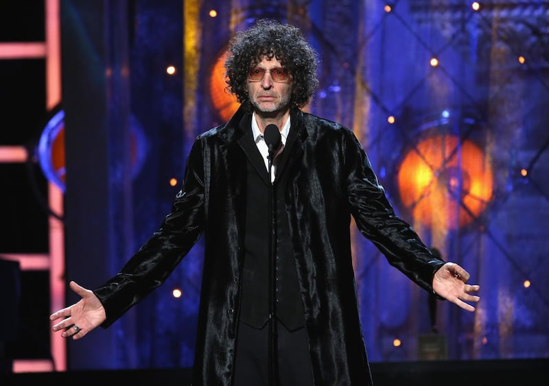 CLEVELAND, OH - APRIL 14: Howard Stern inducts Bon Jovi on stage during the 33rd Annual Rock & Roll Hall of Fame Induction Ceremony at Public Auditorium on April 14, 2018 in Cleveland, Ohio.   Kevin Kane/Getty Images For The Rock and Roll Hall of Fame/AFP