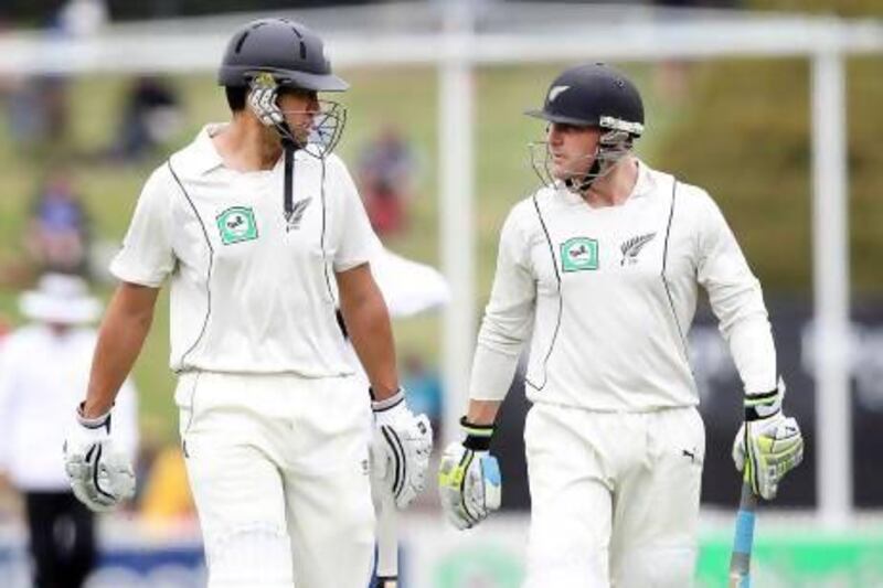 Brendon McCullum, right, is not likely to best Ross Taylor's captaincy record, writes our columnist. Marty Melville / AFP