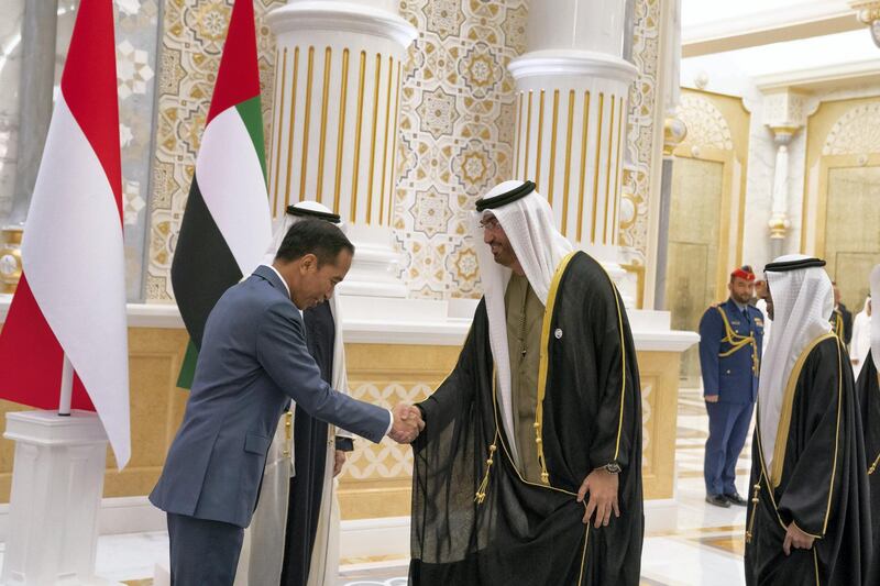 ABU DHABI, UNITED ARAB EMIRATES - January 12, 2020: HE Dr Sultan Ahmed Al Jaber, UAE Minister of State, Chairman of Masdar and CEO of ADNOC Group (R), greets HE Joko Widodo, President of Indonesia (L), during a reception at Qasr Al Watan.

( Hamad Al Kaabi / Ministry of Presidential Affairs )​
---