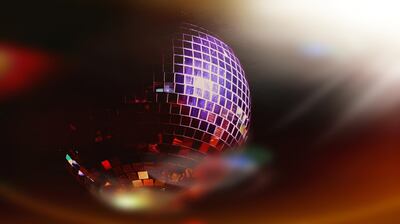 Image of a disco ball in a nightclub. Getty Images