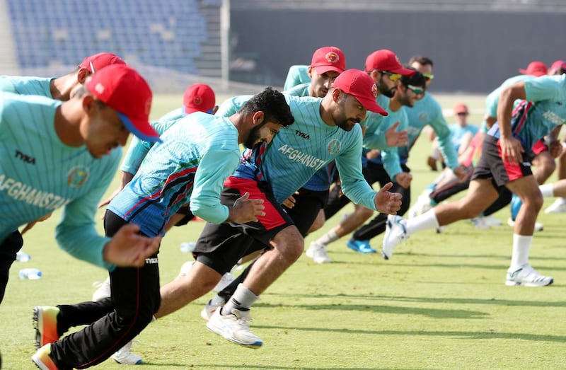 ABU DHABI ,  UNITED ARAB EMIRATES , AUGUST 22 – 2019 :- Rashid Khan, captain ( center ) with the members of the Afghanistan cricket team during the training ahead of their tour to Bangladesh at the Zayed Cricket Stadium in Abu Dhabi. ( Pawan Singh / The National ) For Sports. Interview Story by Amith