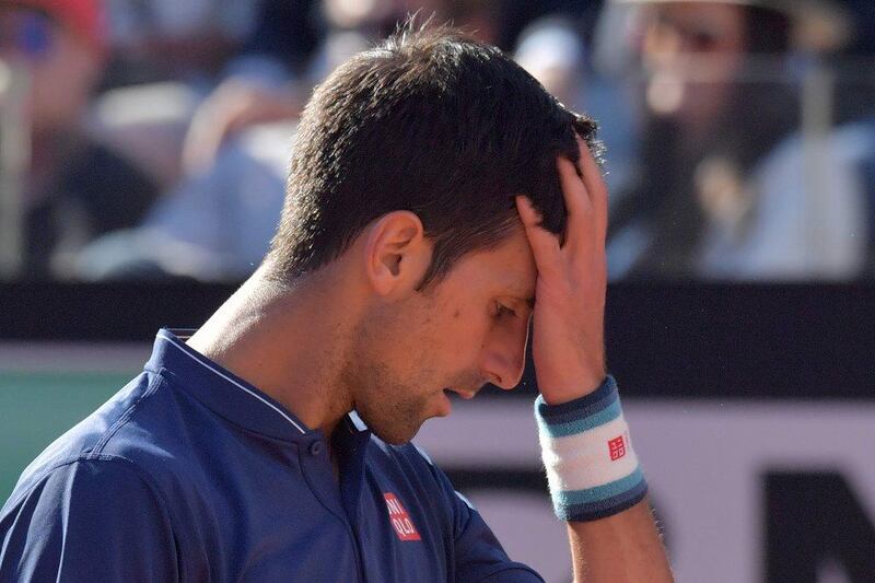 Novak Djokovic of Serbia reacts during the ATP Tennis Open final against Alexander Zverev of Germany, on May 21, 2017 at the Foro Italico in Rome. Tiziana Fabi / AFP