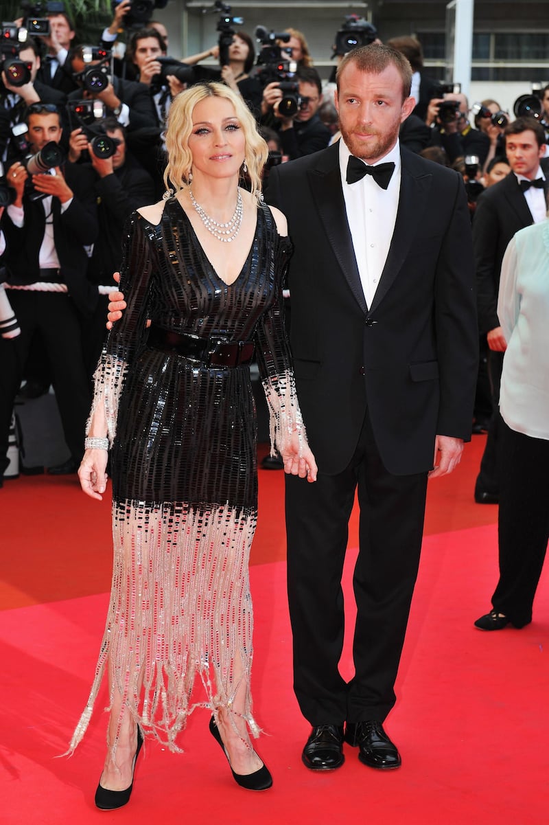 CANNES, FRANCE - MAY 21:  Madonna and husband director Guy Ritchie arrive at the  'I Am Because We Are'  Premiere at the Palais des Festivals during the 61st International Cannes Film Festival on May 21, 2008 in Cannes, France.  (Photo by Pascal Le Segretain/Getty Images)