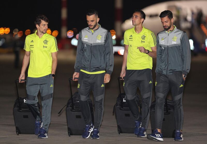 Rodrigo Caio, left, Rhodolfo, second left, Cesar, second right and Pablo Mari of Flamengo upon arrival in Lima, Peru. AP