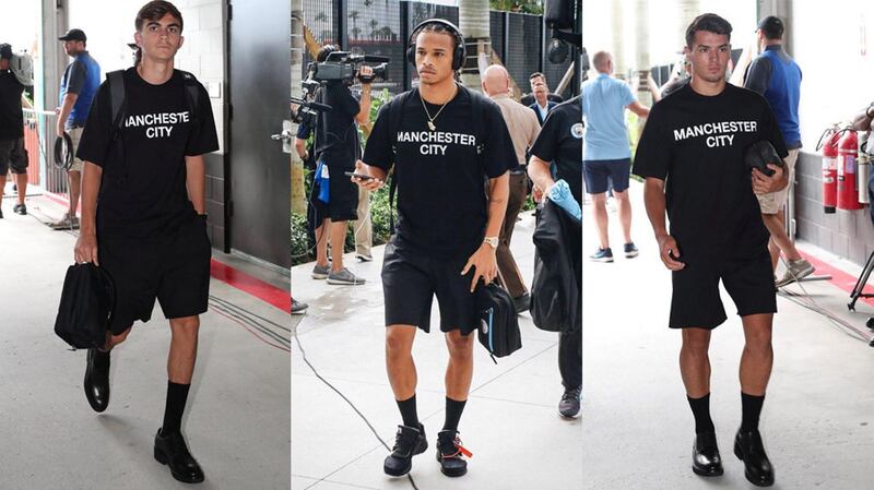Leroy Sane (centre) definitely pulls the DSquared look off more than the rest - in part because of his natural je ne sais quoi, but also because of his smart (but less formal) shoe choice. Photo / Manchester City 