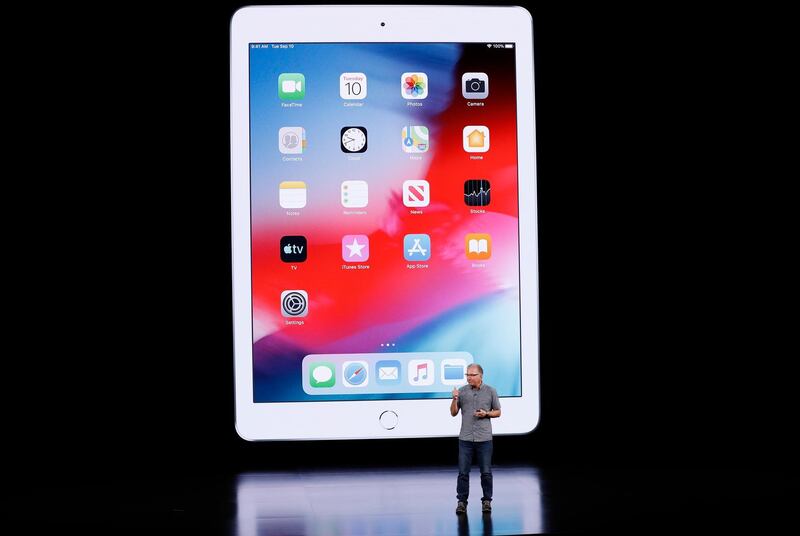 Greg Joswiak, Apple’s vice president of Product Marketing, speaks in front of an iPad at an Apple event at their headquarters in Cupertino, California, U.S. September 10, 2019. REUTERS/Stephen Lam
