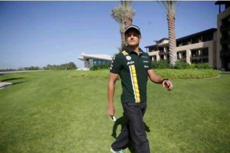 Heikki Kovalainen at the Abu Dhabi Golf Club in Abu Dhabi.