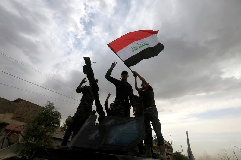 Members of the Emergency Response Division celebrate in the Old City of Mosul, Iraq July 8, 2017. REUTERS/Alaa Al-Marjani TPX IMAGES OF THE DAY