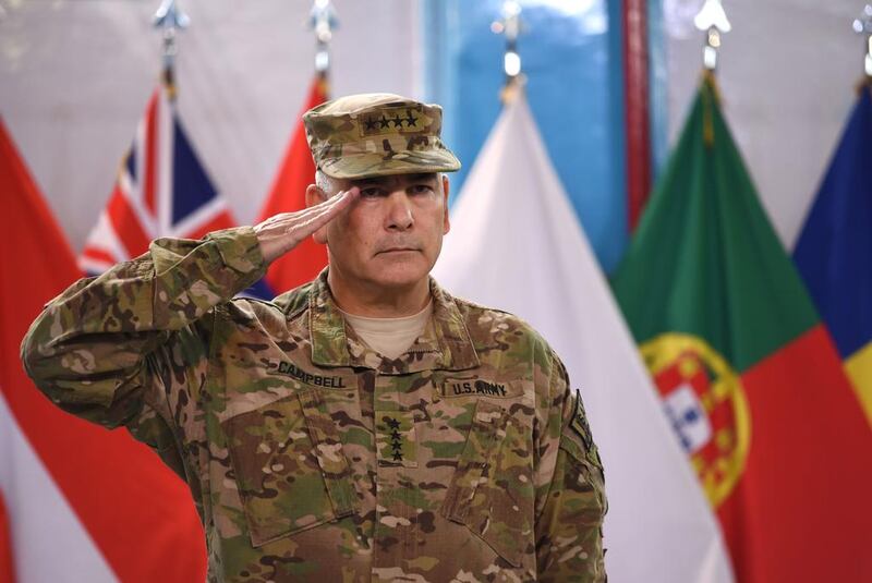 US General John Campbell salutes during a ceremony marking the end of the Nato-led coalition’s combat mission in Afghanistan. Photo: Shah Marai / AFP