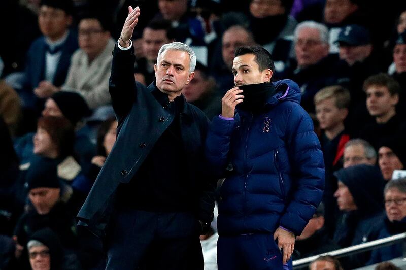 Jose Mourinho talks with assistant head coach Joao Sacramento. AFP
