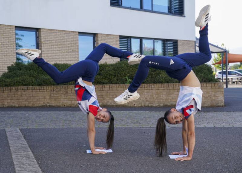 Olympic medal-winning twins Jessica and Jennifer Gadirova celebrate with their GCSE results at Aylesbury Vale Academy in Buckinghamshire.